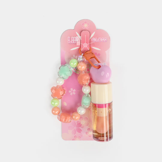 Lip Gloss with Integrated Charm