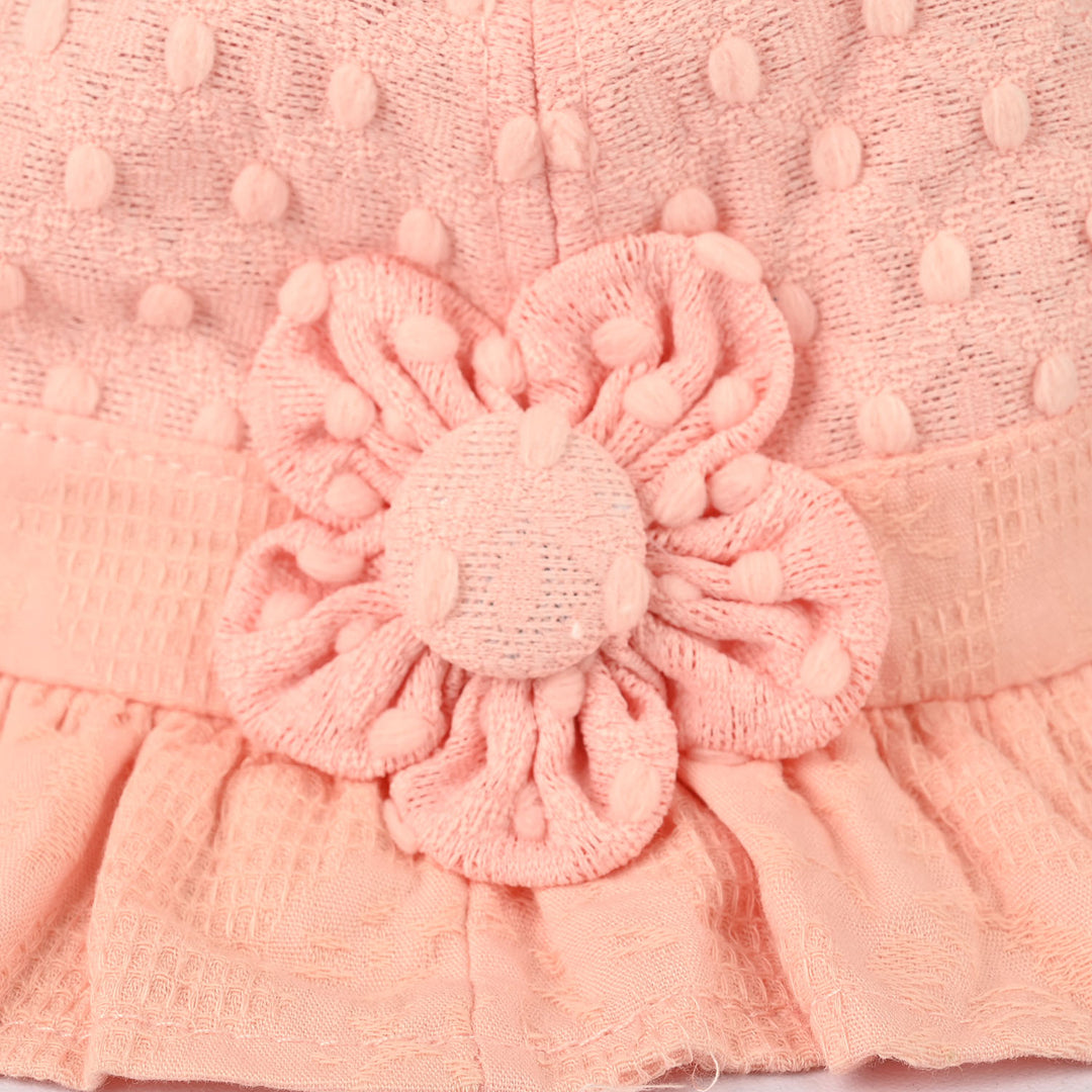 Peach Textured Baby Sun Hat with Ruffled Brim & Flower Accent