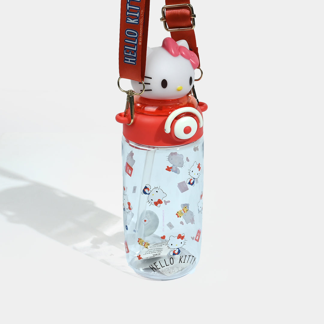 A Hello Kitty water bottle with a clear body, red lid, white Hello Kitty character on top, and a red shoulder strap with blue text, photographed on a clean white background.